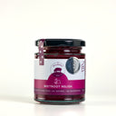 A glass jar of Beetroot Relish by The Mulberry Pig, featuring a black lid, a white and magenta label, and a small Silver medal, set against a plain white background.