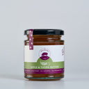 A glass jar of 'The Mulberry Pig' Apple & Thyme Butter on a light gray background. The jar has a black lid, a white and green label, and a purple seal ribbon.