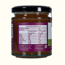 Jar of jam with a nutrition label on a white background