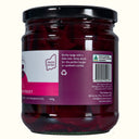 Jar of pickled beets with a label on a white background