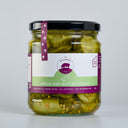 A glass jar of The Mulberry Pig Bread and Butter Pickles with a black lid and a white, green, and purple label, set against a plain light gray background.