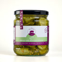 A glass jar of The Mulberry Pig Bread and Butter Pickles with a black lid and a white, green, and purple label, set against a plain light gray background.