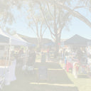 The Mulberry Pig stall at an outdoor farmers market in Perth under gum trees