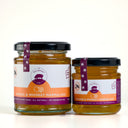 Two jars of The Mulberry Pig Orange & Whiskey Marmalade, the 190g everyday jar beside the 100g picnic jar, on a plain light background.