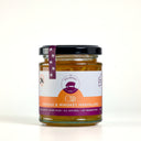 A 190g glass jar of The Mulberry Pig Orange & Whiskey Marmalade with a black lid, white and orange label and purple seal ribbon, on a plain light background.