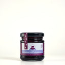A jar of the mulberry pig blueberry and lavender jam, showing the picnic jar size with purple branding and light blue product stripe.