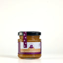 A glass Picnic size  jar of The Mulberry Pig apple pear and ginger chutney with a black lid and a purple label, photographed on a clean white background. The label includes a 'Made in WA' seal and product details.