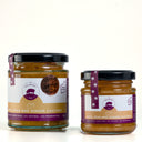 two glass jar of The Mulberry Pig apple pear and ginger chutney in 2 different sizes with a black lid and a purple label, photographed on a clean white background. The label includes a 'Made in WA' seal and product details.