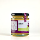 A glass jar of 'The Mulberry Pig' Lemoncello Curd with Gincello, featuring a black lid, the sin gin distilery logo, a purple and white label with green accents, and a purple paper seal, set against a plain white background.