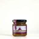 A Picnic size glass jar of Smoked Onion Marmalade with a black lid and a purple accent ribbon, set against a plain white background.