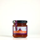 A picnic size glass jar of Mulberry Pig Sweet Chilli Jam with a black lid and a white, orange, and purple label, set against a plain white background.